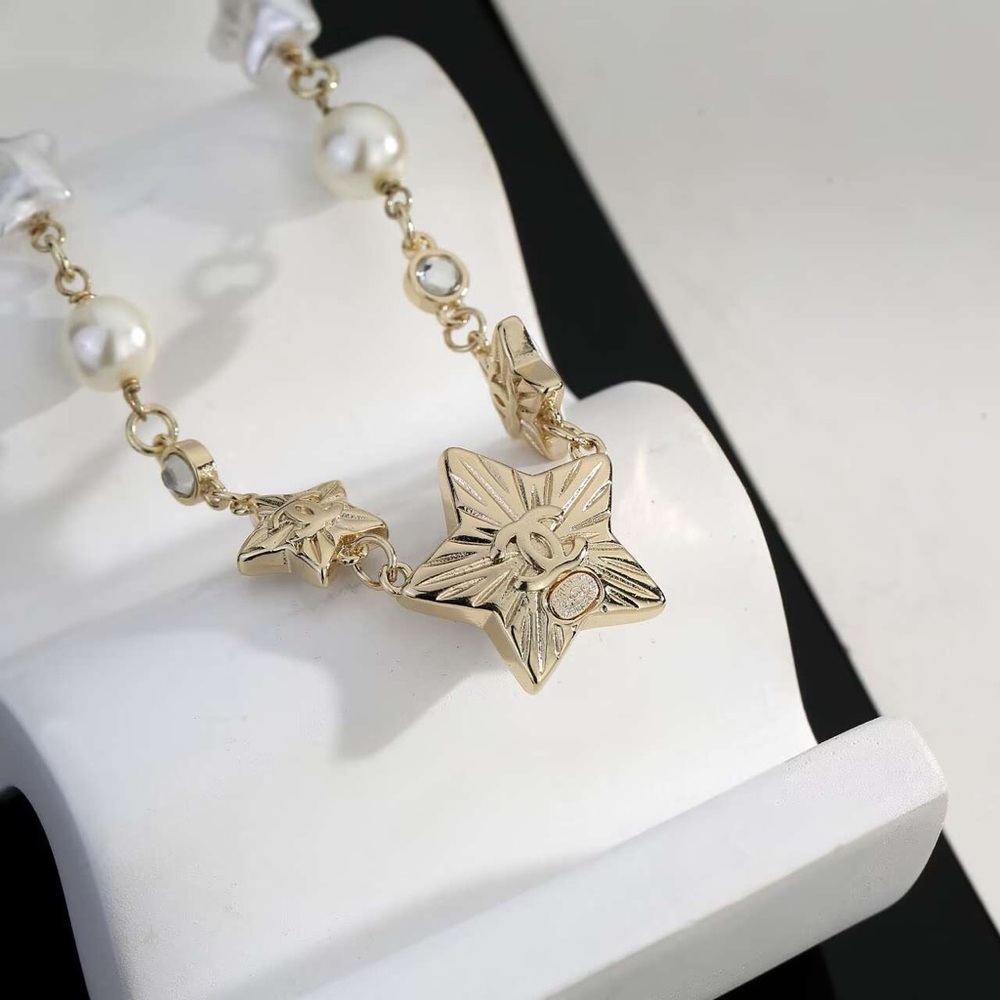 CHANEL Gold and White Star Necklace - Picture 6 of 6